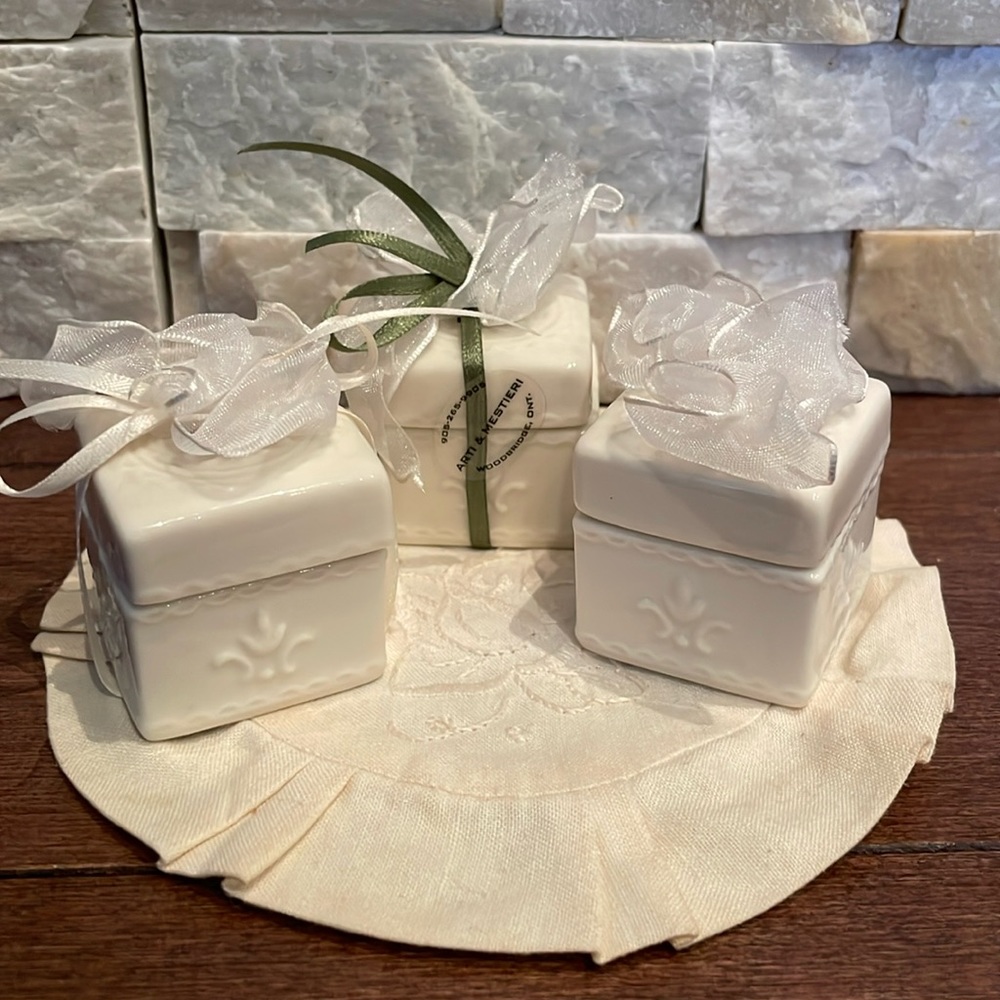 3 trinket boxes with decorative mat
